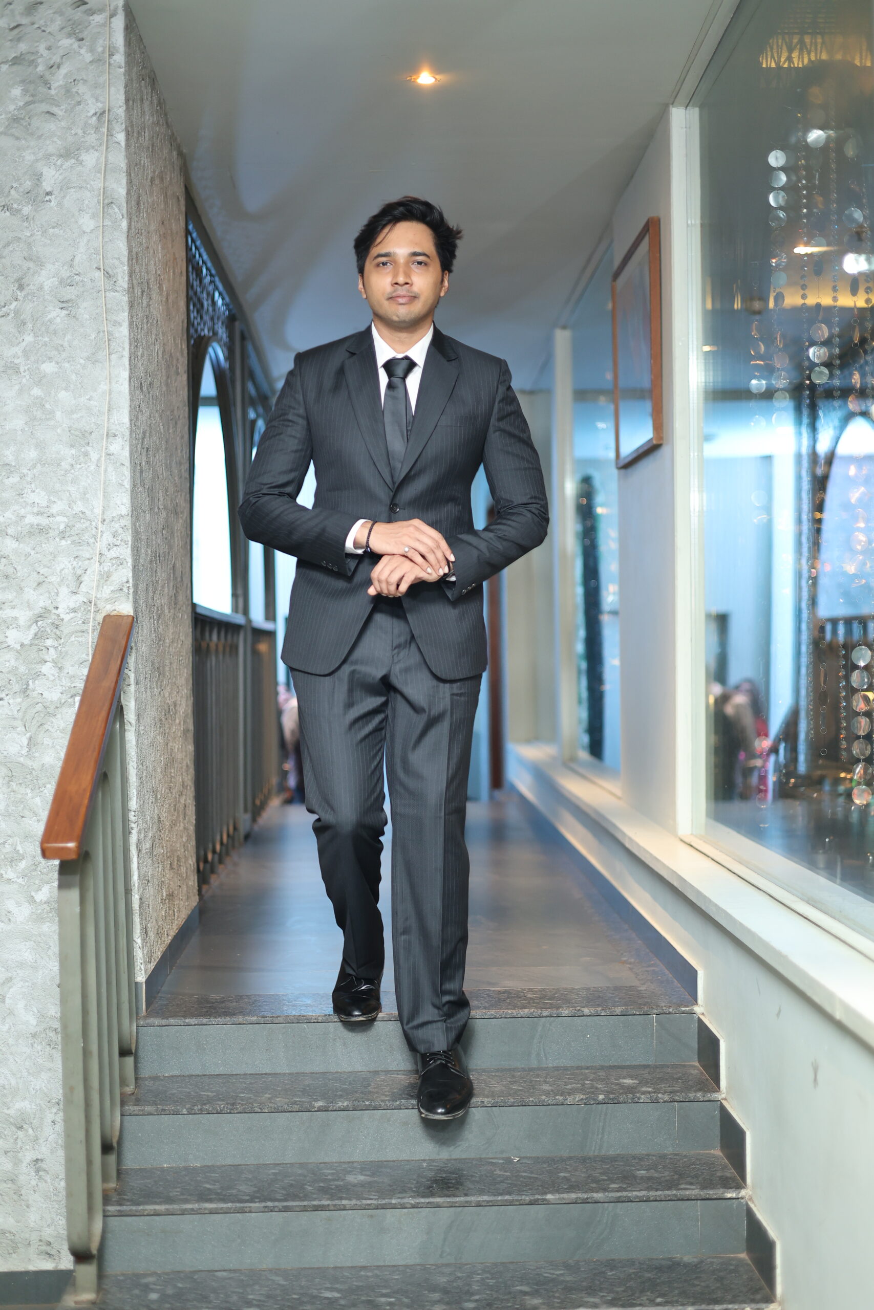 Aniket Iyengar son of Sampath Iyengar Senior Manager Urban Company Mumbai in charcoal suit