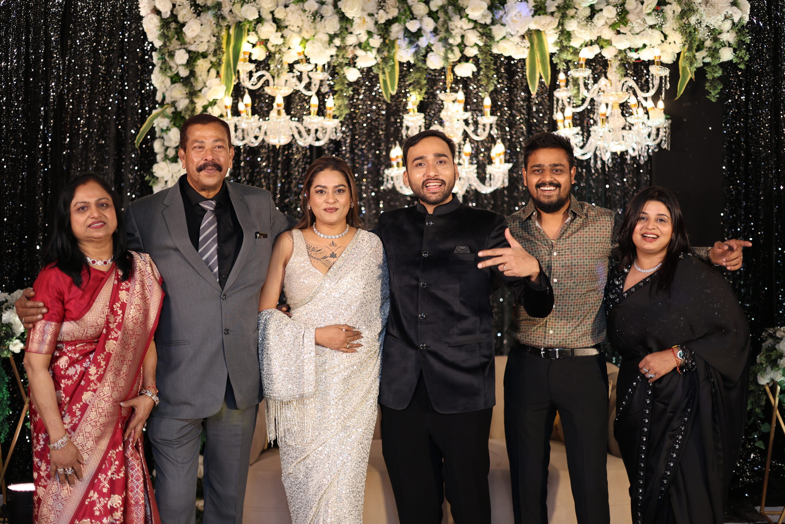 Rachel D'Costa and Kunal Iyengar with Rachel's family Bharati Alwin Neil and Roma D'Costa at wedding reception