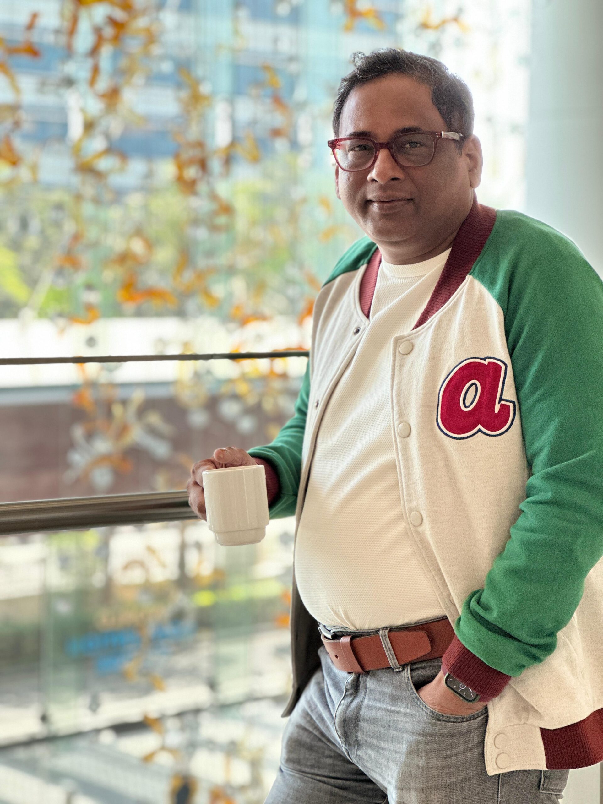 Sampath Iyengar at AI training seminar at Jio World Mumbai varsity jacket