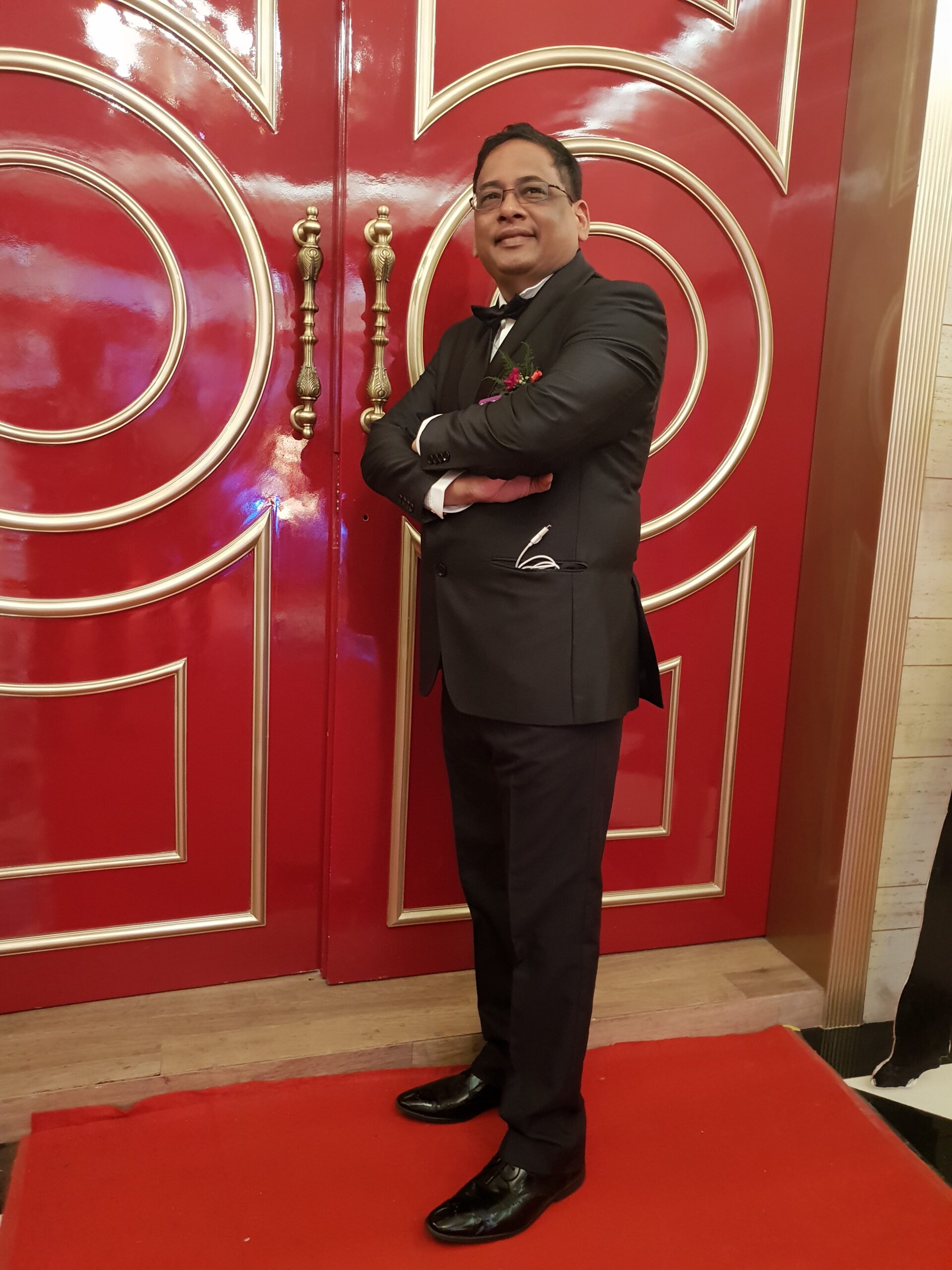 Sampath Iyengar in tuxedo at Rotary Governor Aide year event